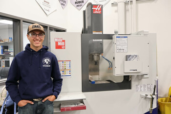 Adam, one of the school's machinist program students.